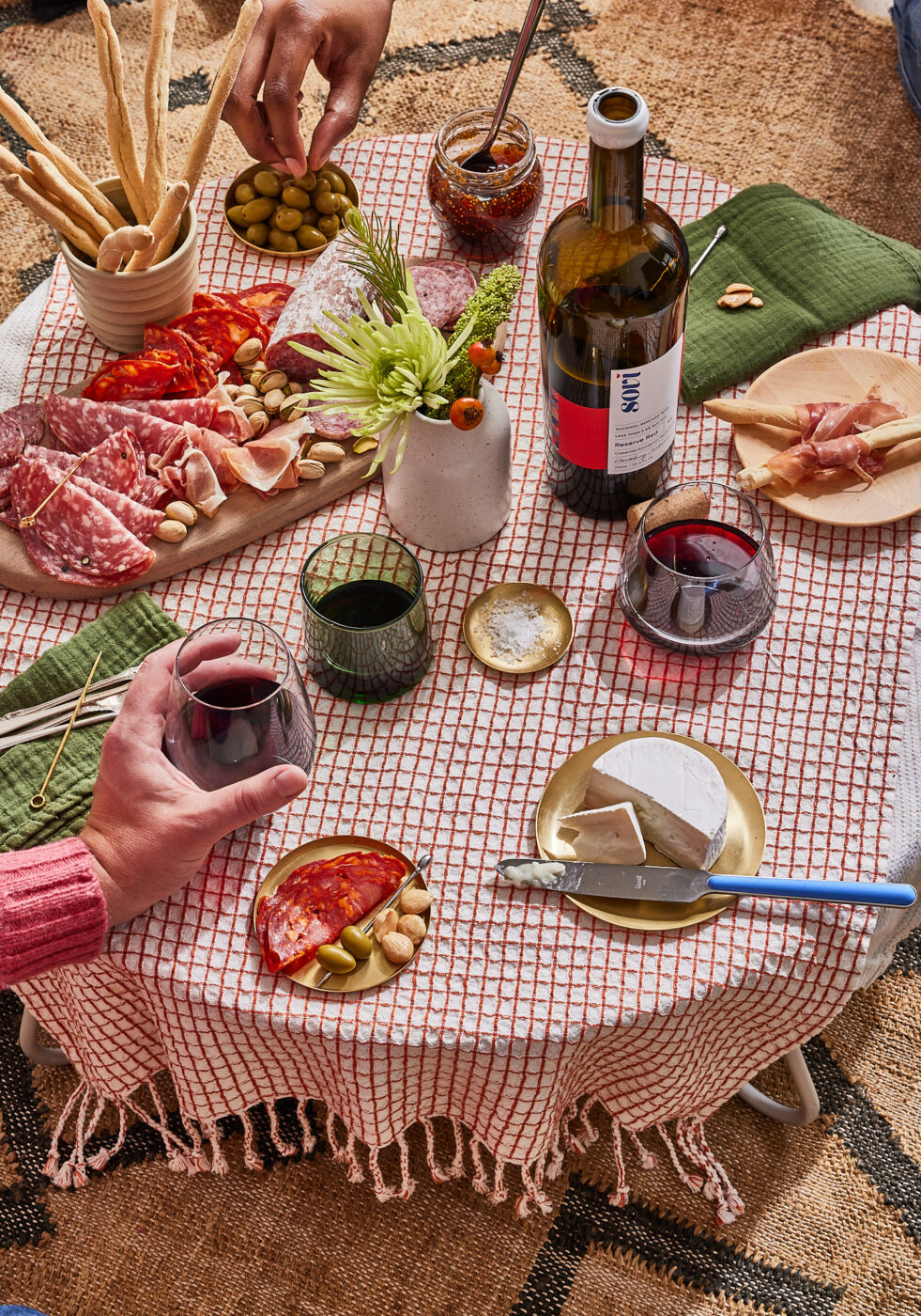 Napa-based Sovi makes nonalcoholic wines in a lovely, dry style, including a crisp sparkling white blend of Chenin Blanc, Pinot Gris and Gewürztraminer; a floral sparkling Rosé of Pinot Noir and Tempranillo; a light bodied blend of Pinot Noir, Tempranillo and Petite Sirah; and a playful, tropical Wild Child Pinot Gris orange wine. (Courtesy of Sovi)