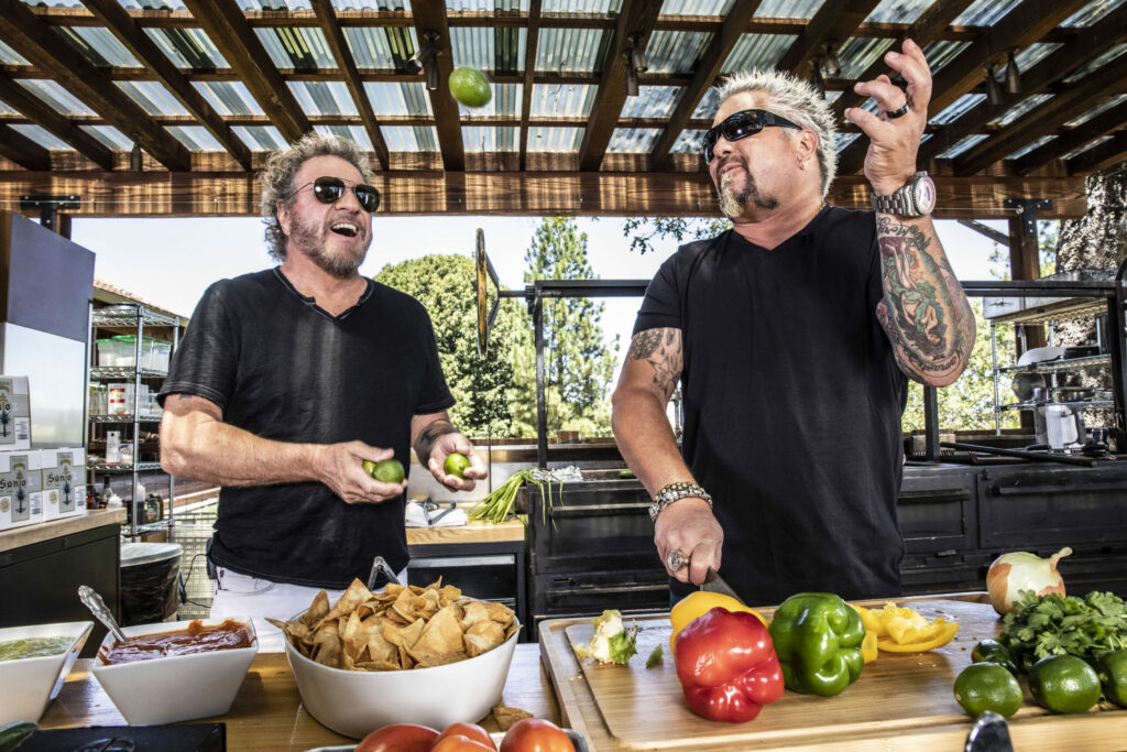 Sonoma County celebrity chef Guy Fieri and rock 'n' roll frontman Sammy Hagar in a promotional image for Santo Tequila, which they founded in 2019. An estimated $1 million of the tequila was hijacked earlier this month, according to the company. (Santo Tequila)