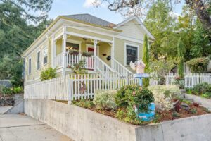 This two-bedroom, one-bathroom home on Sebastopol's Florence Avenue—know for its row of junk art sculptures—is currently listed for $755,000. (Jesse West / Aerial Photography)