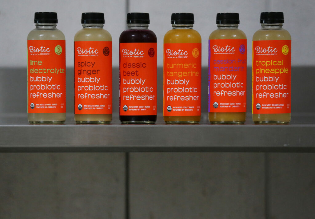 Six different flavors of Biotic Ferments probiotic drinks include lime electrolyte, spicy ginger, classic beet, turmeric tangerine, passion fruit mandarin, and tropical pineapple. Photo taken at its production facility in Petaluma, on Wednesday, June 22, 2022. (Beth Schlanker/The Press Democrat)