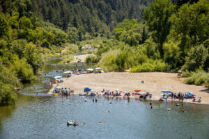 Hacienda Beach, seen from the bridge over River Road, continues to be a hotspot in the ongoing dispute over public access to privately owned beaches along the Russian River in Forestville, Friday, July 5, 2024. (John Burgess / The Press Democrat)