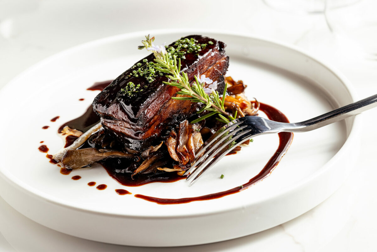 Espresso-braised pork belly, maitake mushroom, warming spices, pork jus from Songbird Parlour Thursday, November 21, 2024 in Glen Ellen. (John Burgess / The Press Democrat)