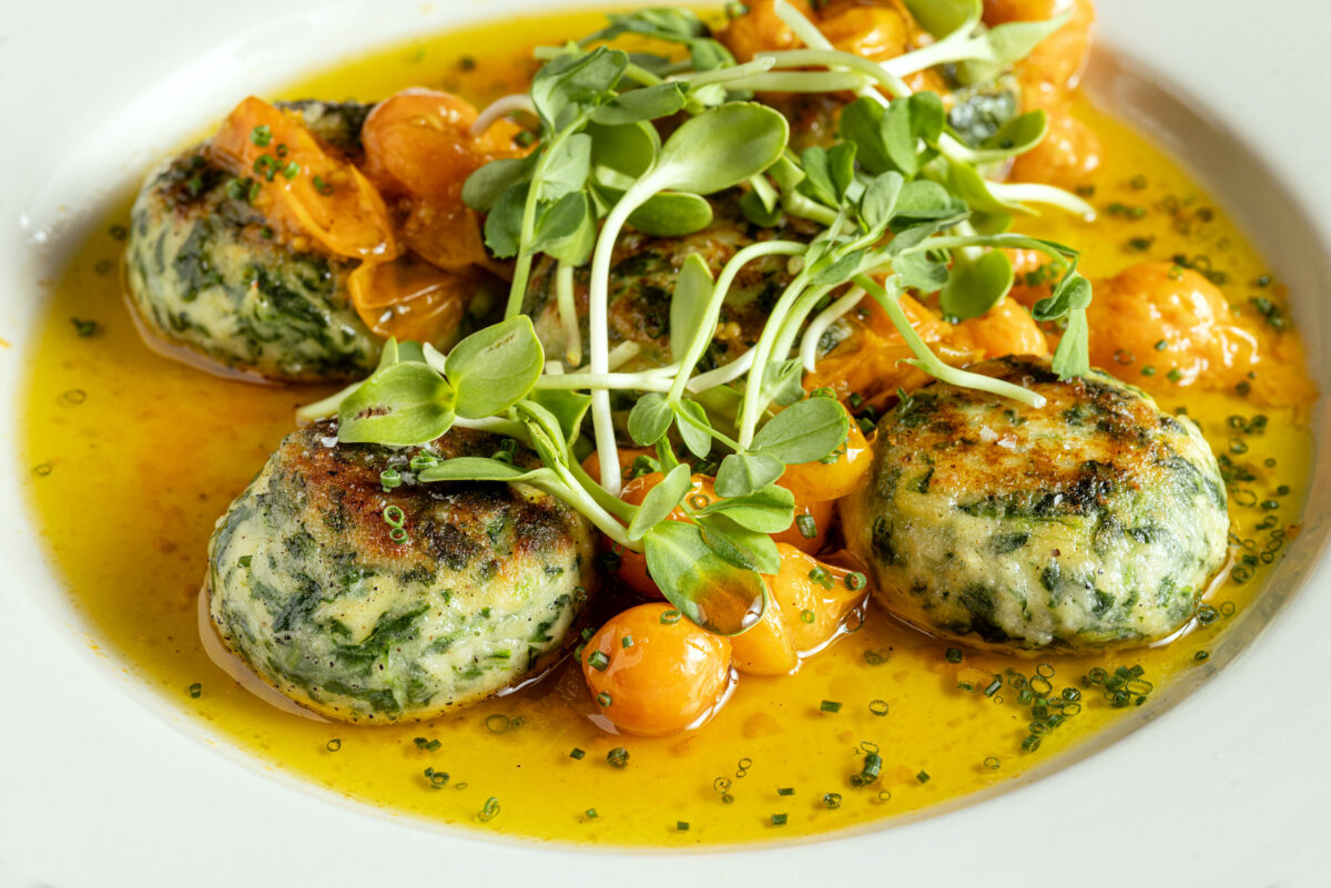 Ricotta and arugula gnudi, oil-cured Oak Hill cherry tomato, red onion confiture from Songbird Parlour Thursday, November 21, 2024, in Glen Ellen. (John Burgess / The Press Democrat)