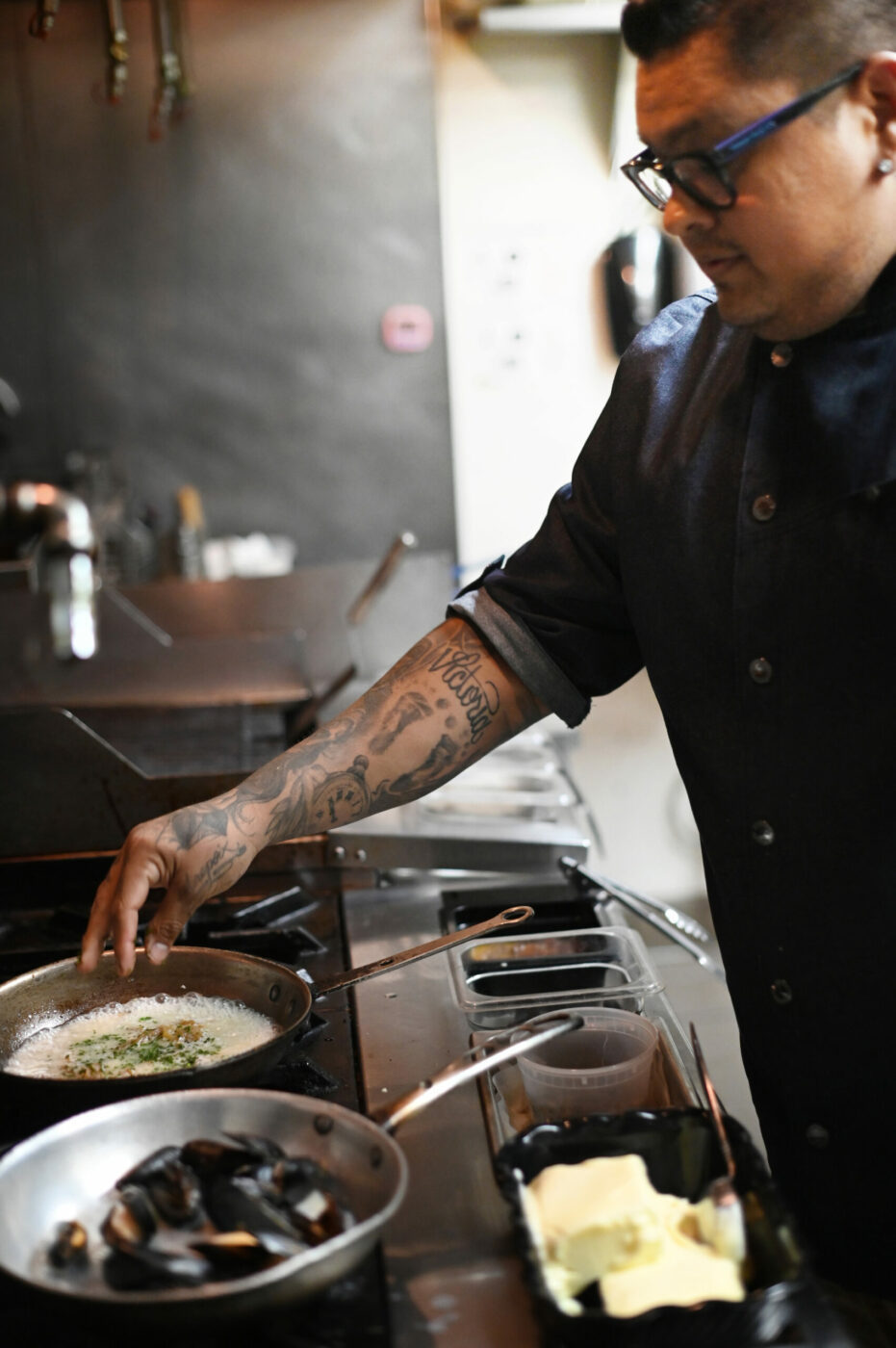 Chef Jorge Flores at Costeaux French Bakery preparing classic French bistro menu items for the patio at their cafe in Healdsburg on Wednesday, July 31, 2024. (Erik Castro / For The Press Democrat)