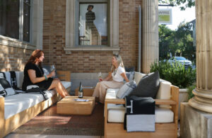 Leah Harris, right, and Nancy Brandt drink wine at the outdoor lounge area at The Harris Gallery in Healdsburg on Thursday, September 16, 2021. (Christopher Chung/ The Press Democrat)