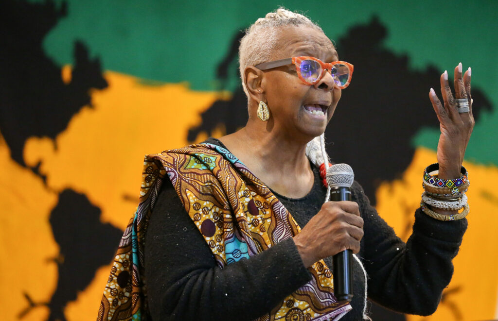 Poet Enid Pickett recites her poem “Nia” during the sixth annual Nubian Cafe Collective Kwanzaa Program in Rohnert Park on Monday, Dec. 30, 2024. (Christopher Chung/The Press Democrat)