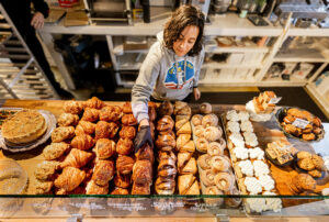 Amina Syammach and the Quail & Condor bakery team create a mosaic of pastries for the early morning rush Monday, Jan. 6, 2025, in Healdsburg. (John Burgess / The Press Democrat)