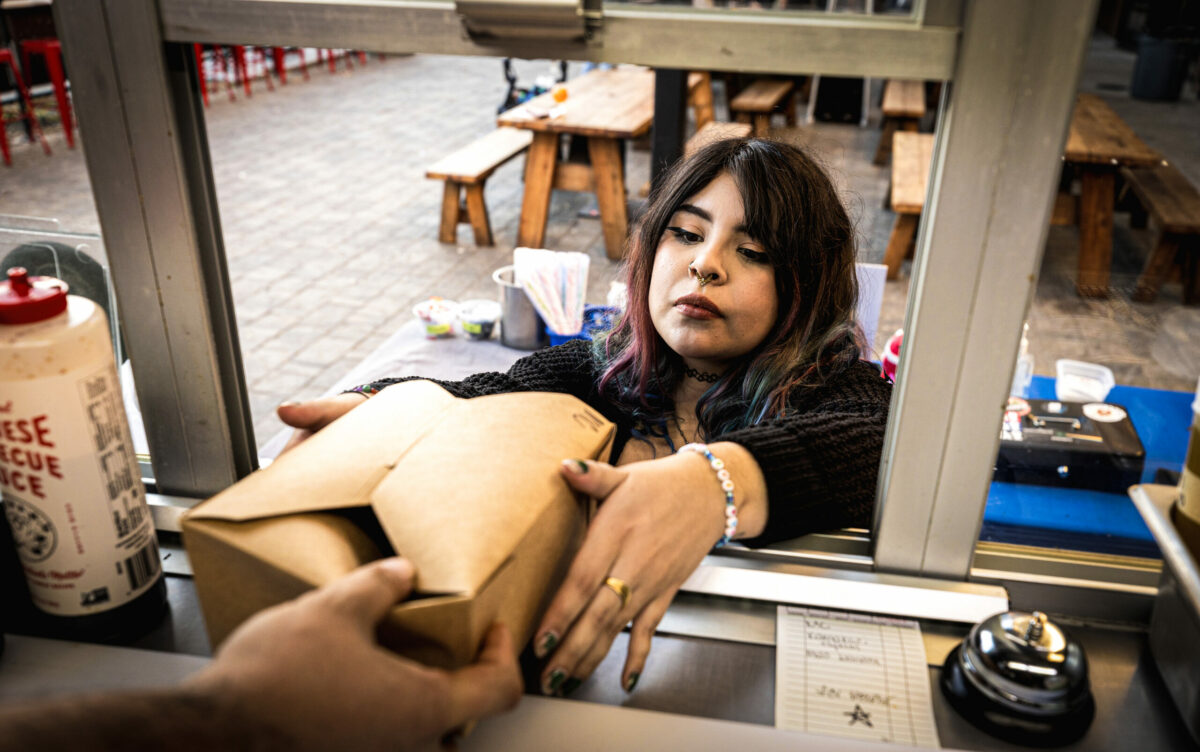 Marley Jade Trujillo, the sister of co-owner Elijah, serves up the Asian street food at the Shokakko food truck on their regular Thursday night visit Jan. 23, 2025 at Old Caz Beer in Rohnert Park. (John Burgess / The Press Democrat)