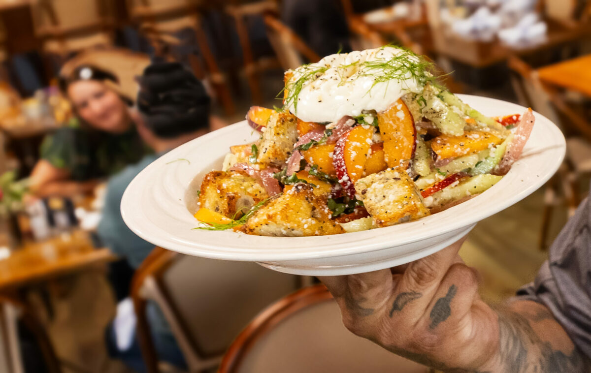 Peach Panzanella Salad is made with Costeaux Bakery bread from chef Jorge Flores. Photo taken Friday, June 30, 2023, at the Healdsburg bakery. (John Burgess / The Press Democrat)