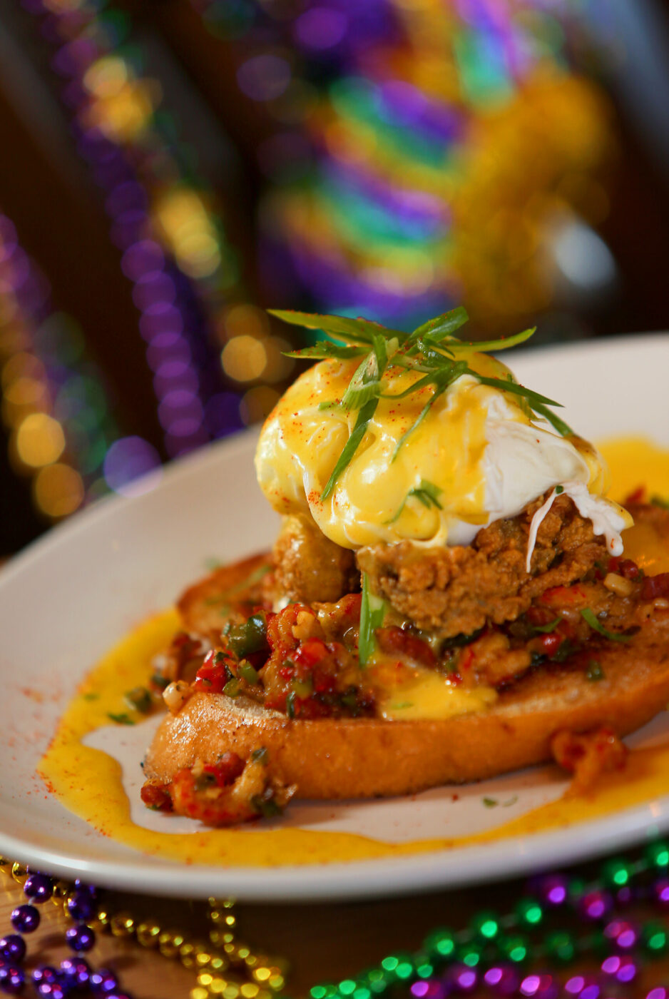 Eggs Bon Temps, consisting of crawfish and oyster benedict, at The Parish Cafe in Healdsburg. (Christopher Chung / The Press Democrat)