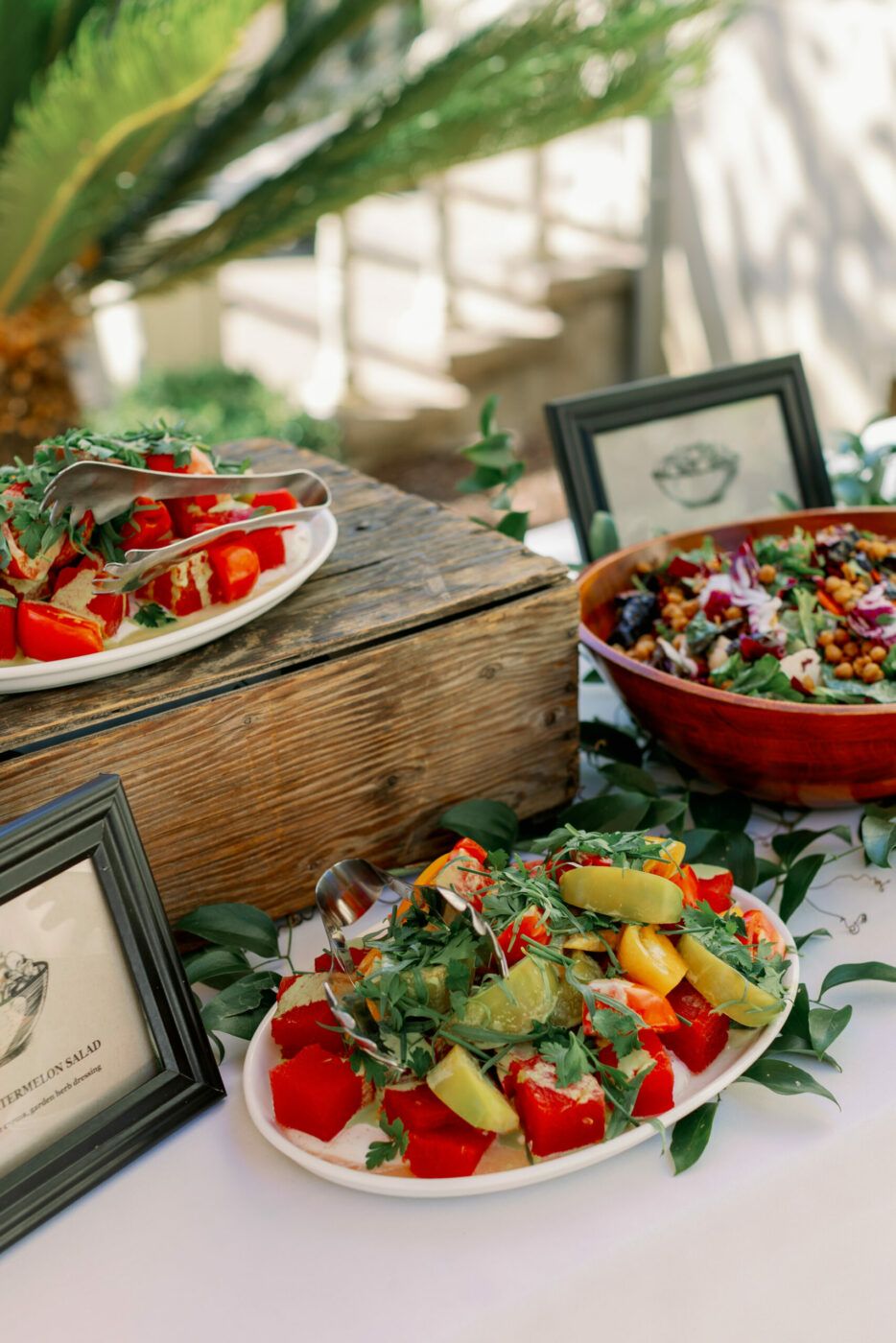 The harvest luncheon at the wedding included three types of pizza, salmon and chicken, and Mediterranean sides and spreads. (Kathryn White)