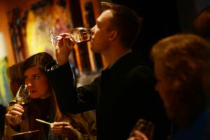 San Francisco visitors taste wine at the Thumbprint Cellars tasting room in downtown Healdsburg. (Erik Castro / for The Press Democrat)