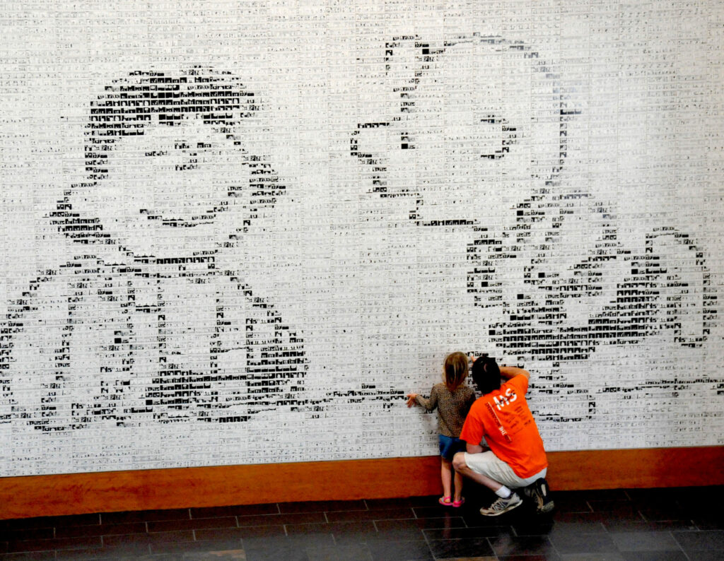 Guests check out the large mural at the Charles M. Schulz Museum in Santa Rosa. (Sonoma County Tourism)