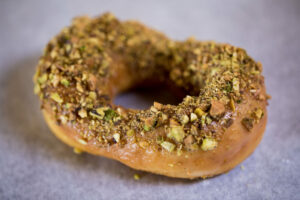 Pistachio cardamom doughnut from Carmel-based Dutch Door Donuts. The cooked-to-order doughnuts will be coming to Healdsburg in spring 2025. (Photo: Patrick Tregenza)