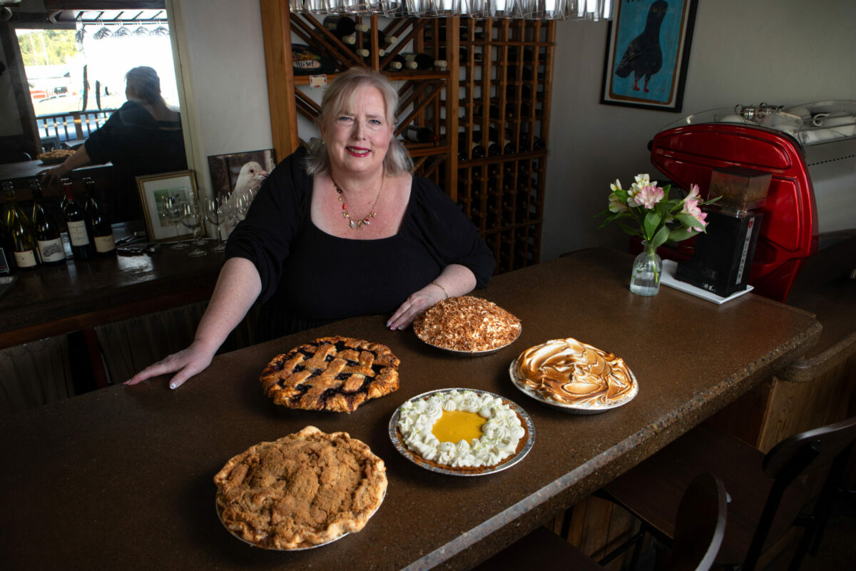 Co-owner, Michele Wimborough shows off her pies, from left front, Apple Crumb, Passion Fruit, Meyer Lemon, and back from left, Blueberry Lattice and Coconut Cream at Hazel Restaurant in Occidental, Friday, January 24, 2025. Pies at Hazel are baked once a week every Friday. (Darryl Bush / For The Press Democrat)