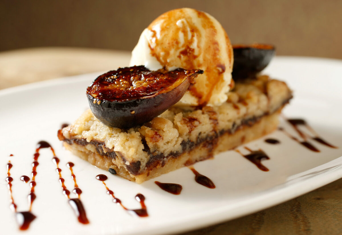 Fig crisp with cream cheese ice cream, fig and port syrup at The Girl & The Fig in Sonoma, on Thursday, August 25, 2016. (Alvin Jornada / The Press Democrat)