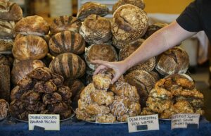 Wild Flour Bread in Freestone bakes about 1,000 loaves, scones and sticky buns each day. (John Burgess/The Press Democrat)