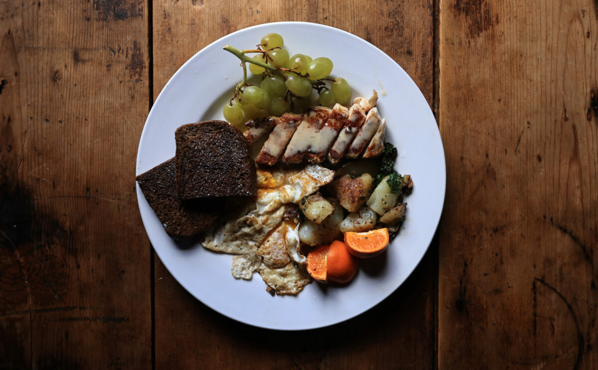 For breakfast, the pork chop and egg with potatoes and toast, and a side garnish of fruit, Saturday, March 21, 2024, at the Casino Bar & Grill in Bodega. (Kent Porter / The Press Democrat) 2024