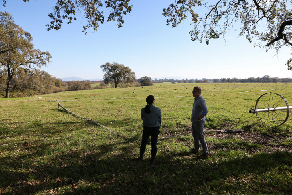 Sonoma County Ag + Open Space acquisition specialist, left, talks with Brian Denner at Denner Ranch, which is part of a conservation easement project, in Santa Rosa on Wednesday, November 29, 2023. (Christopher Chung/The Press Democrat)