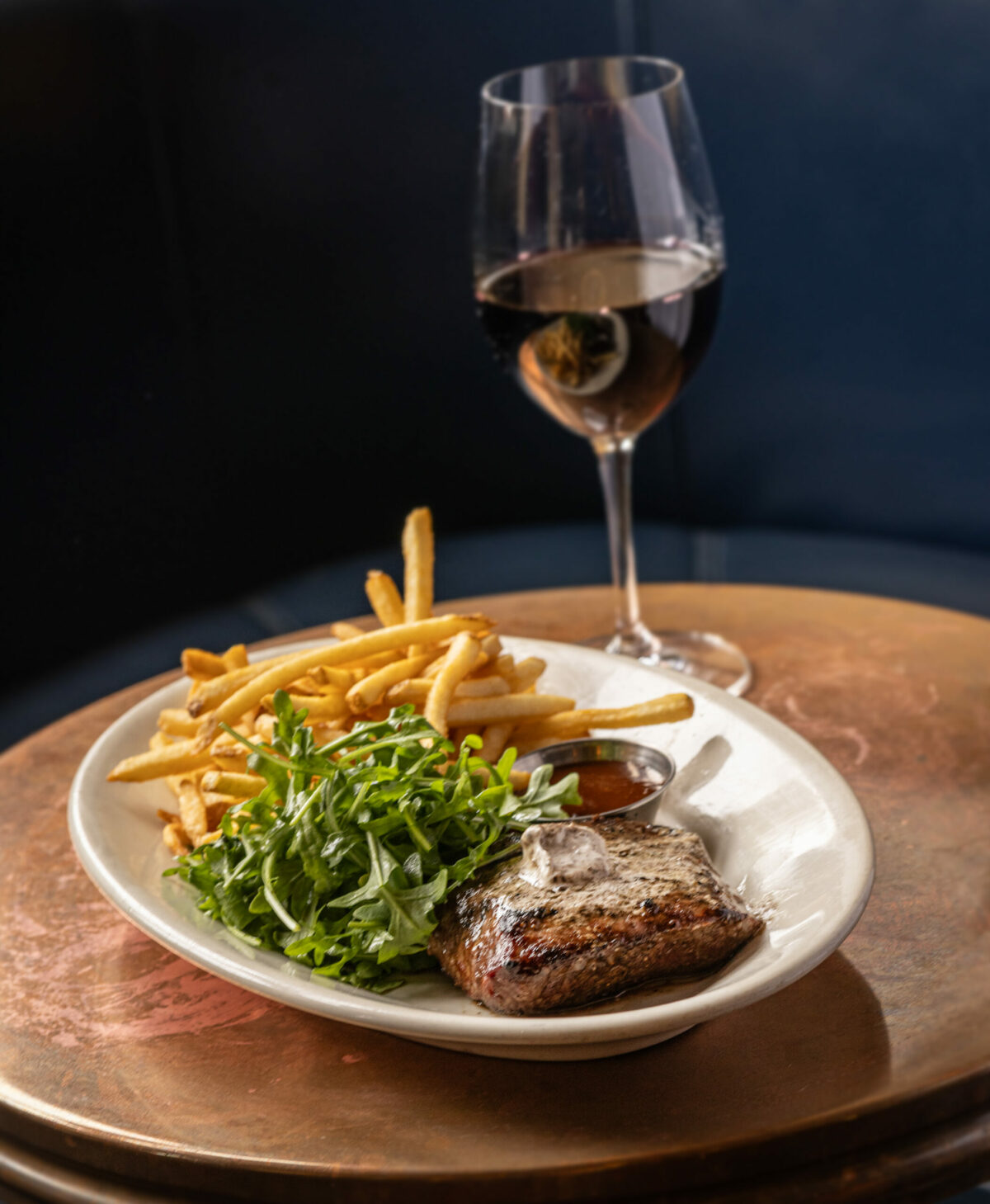 Flat Iron Steak Frites with mushroom-shallot butter, arugula, chipotle steak sauce and frites from Underwood Bar and Bistro Friday, March 21, 2025, in Graton. (John Burgess / The Press Democrat)