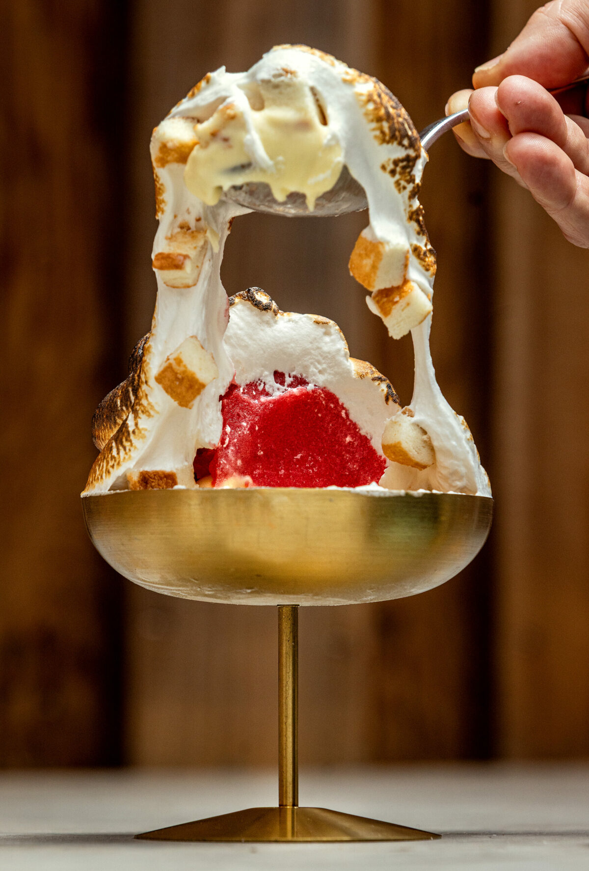 The interior of Stella’s Baked “Gelaska” with vanilla gelato, raspberry sorbet, sponge cake and cubes of torched marshmallow fluff Wednesday, March 26, 2025, in Kenwood. (John Burgess / The Press Democrat)