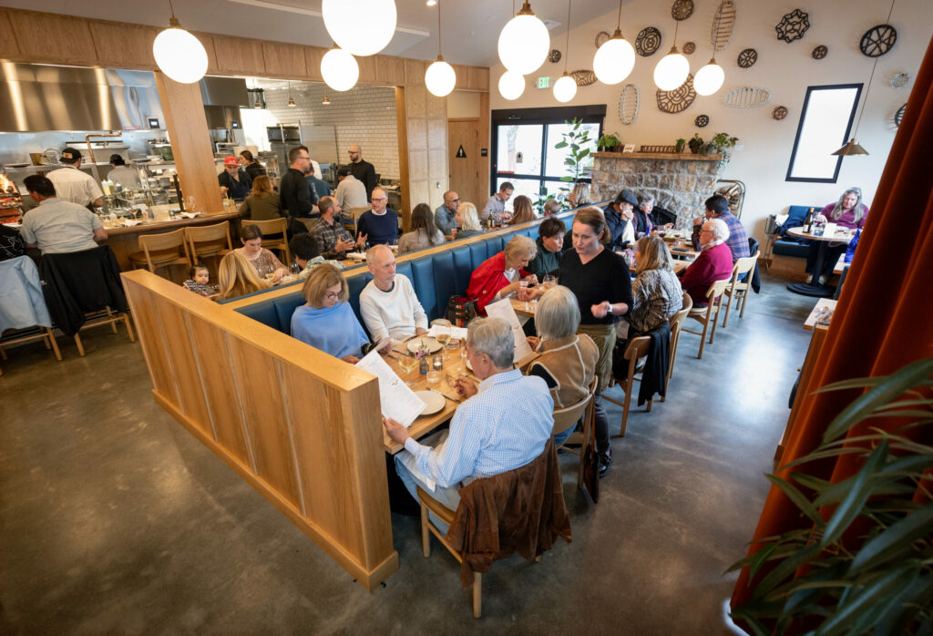 The main dining room with counter seating and a view of the open kitchen at the new Stella restaurant in the old Cafe Citti space on Highway 12 in the Sonoma Valley Wednesday, March 26, 2025, in Kenwood. (John Burgess / The Press Democrat)