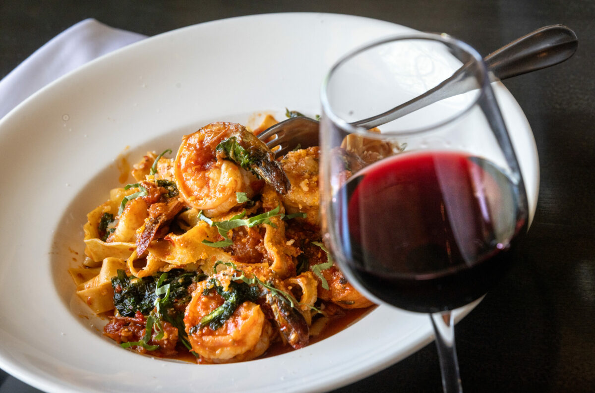 Shawnee’s Shrimp Diavolo with Calabrian chiles, roasted tomatoes, sautéed greens, basil and fresh fettuccini from Grata Italian Eatery chef/owner Eric Foster Thursday, May 8, 2025, in Windsor. (John Burgess / The Press Democrat)
