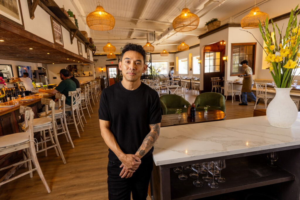 Farmhouse Sonoma owner Pemba Sherpa’s carpenter brother created tables and other touches from barn wood found at his Napa home to create a quaint environment in the old Palms restaurant location Friday, May 9, 2025 in Sonoma. (John Burgess / The Press Democrat)