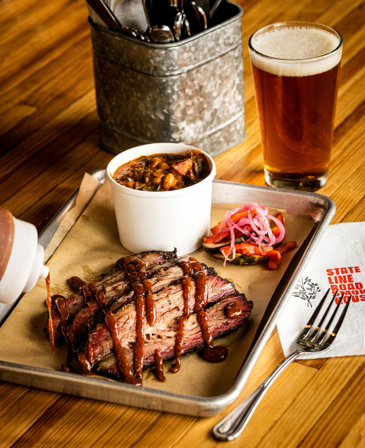 Smoked Brisket with a side of Rancho Gordo Beans & Greens from Stateline Road Smokehouse Friday, August 23, 2024, in Napa. (John Burgess / The Press Democrat)