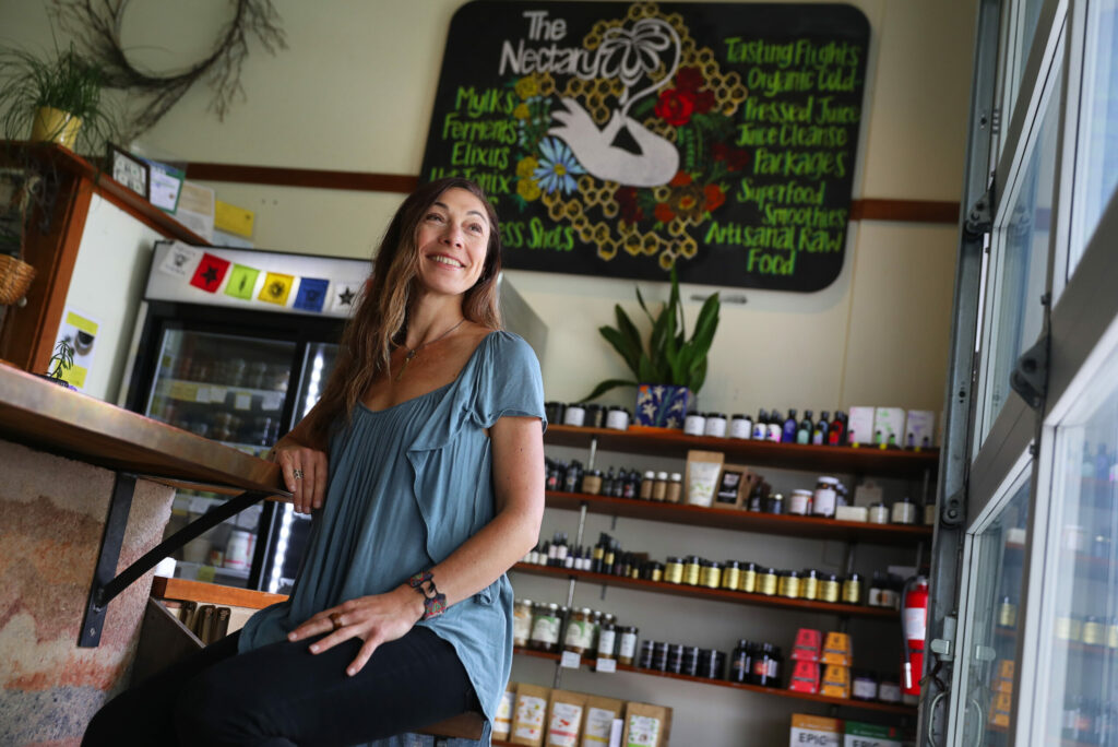 Gia Baiocchi is the owner of The Nectary, a juice and smoothie bar at The Barlow in Sebastopol. (Christopher Chung/ The Press Democrat)
