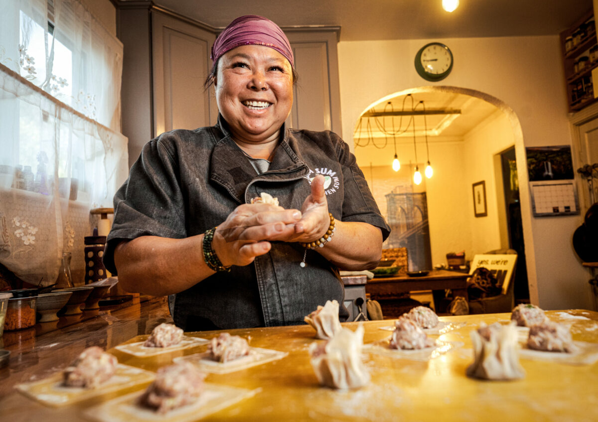 Michelle Wood, the new owner of Jimtown Store, flattens the bottom of her shrimp and pork shumai so they stand up on the plate at her home in Santa Rosa, Friday, Jan. 24, 2025. (John Burgess / The Press Democrat)