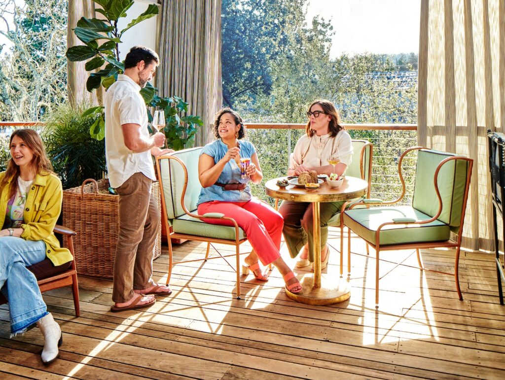Customers dine at Little Saint in Healdsburg, a temple to the union of plant-based food, wine and live music. (Kim Carroll)