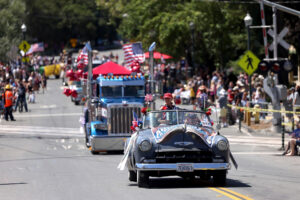 Parade participants roll down Main St. during the 48th annual Penngrove parade in Penngrove, Sunday, July 7, 2024. (Beth Schlanker / The Press Democrat)