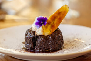 For dessert, a Chocolate Lava Cake with a molten center and vanilla ice cream from Farmhouse Sonoma in the old Palms Grill restaurant location Friday, May 9, 2025, in Sonoma. (John Burgess / The Press Democrat)