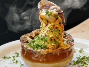 Onion Soup Gratinee with croutons and melted gruyère from Brigitte Bistro Sunday, July 6, 2025 in Petaluma. (John Burgess / Press Democrat)