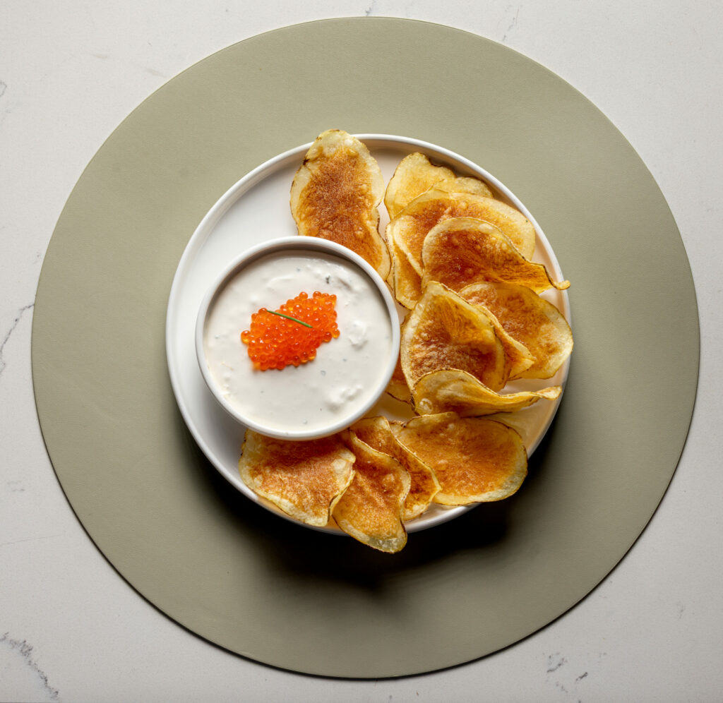 Crisps and Dip with smoked salmon whipped creme fraiche topped with roe from The Burrow Wednesday, July 9, 2025 just off the square in Healdsburg. (John Burgess / The Press Democrat)