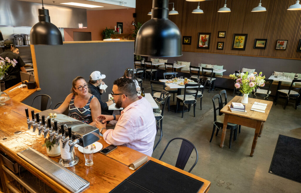 The bar and main dining room at The Burrow Wednesday, July 9, 2025 just off the square in Healdsburg. (John Burgess / The Press Democrat)