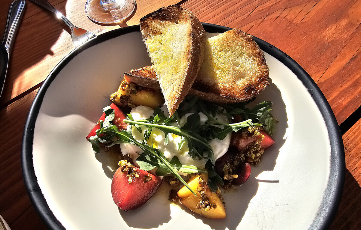 Burrata salad with fresh stone fruit at The Waterhawk in Rohnert Park. (Heather Irwin/Sonoma Magazine)