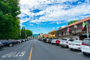 Cars parked by Sonoma Plaza in downtown Sonoma, flanked by historical buildings. (Michael Vi / Getty Images)