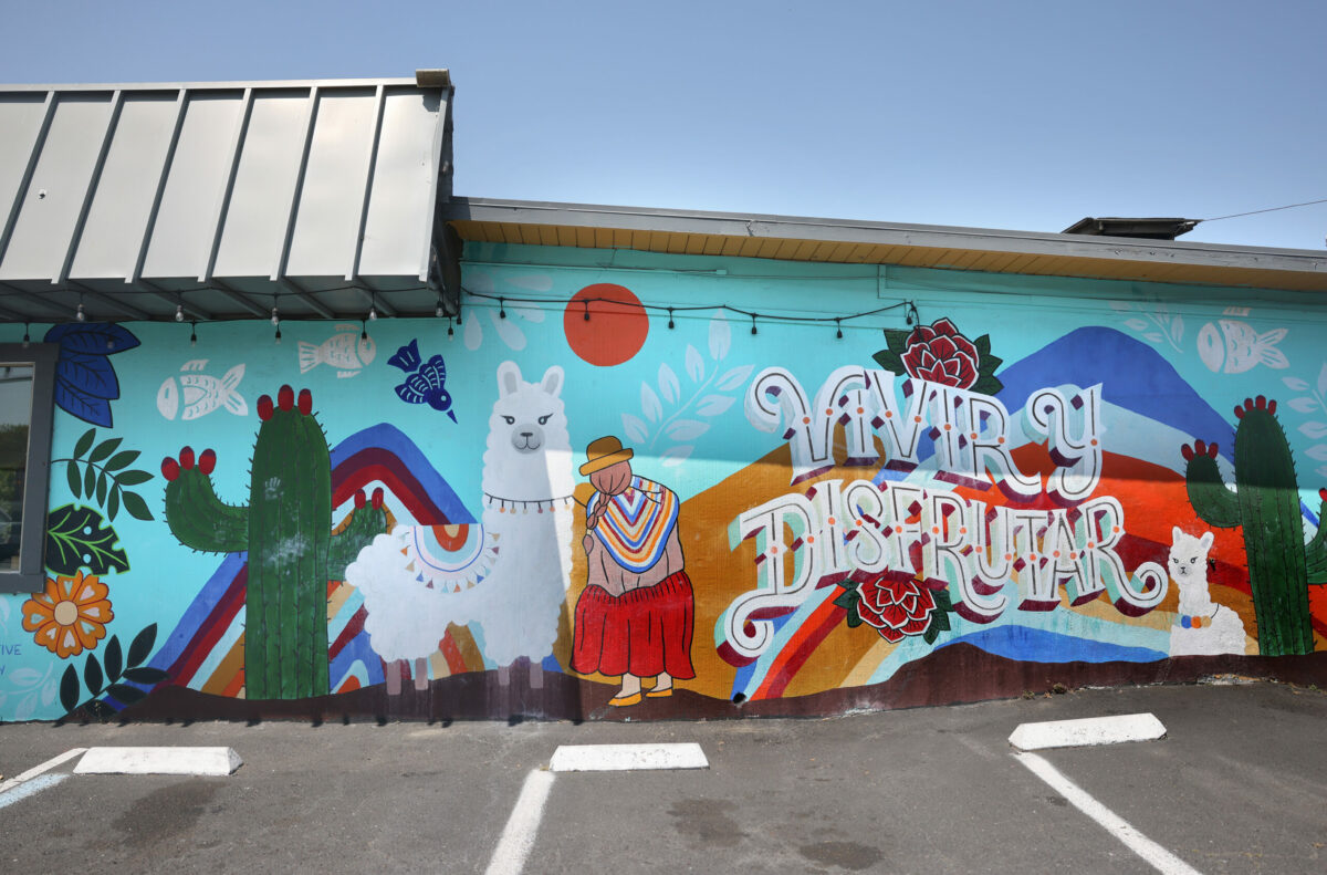 Artist Blanca Molina's colorful mural, which translates to “live and enjoy life,” continues to bring smiles to those who pass by Sazón Peruvian restaurant on Sebastopol Road in Santa Rosa. (Beth Schlanker / The Press Democrat)