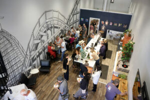 People attend a Petaluma Chamber of Commerce mixer at the Montagne Russe Winery and Record Lounge in Petaluma Thursday, July 31, 2025. (Beth Schlanker / The Press Democrat)