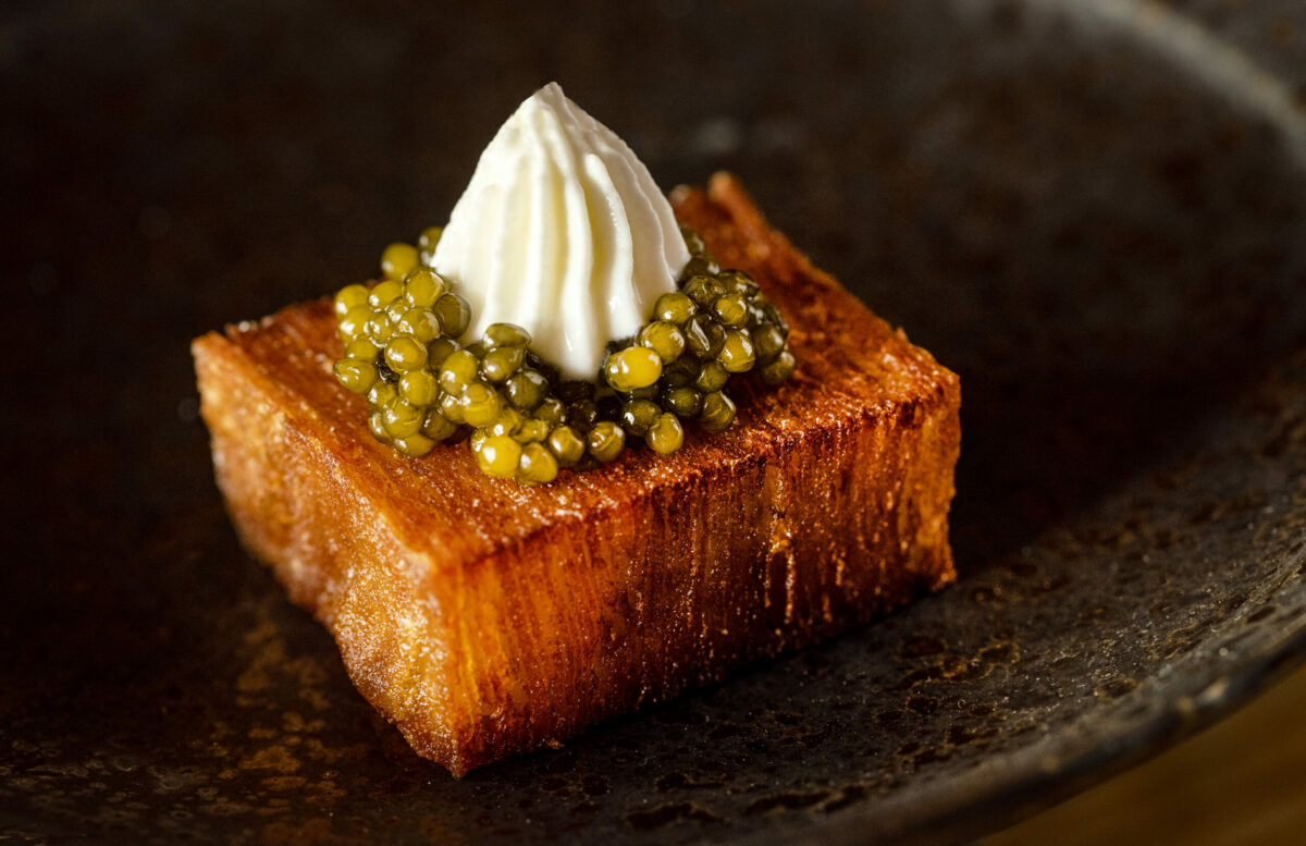 Thousand Layer Potato with créme friache bite from the new prix fixe tasting menu at The Lodge at Dawn Ranch Thursday, September 4, 2025 in Guerneville. (John Burgess / The Press Democrat)