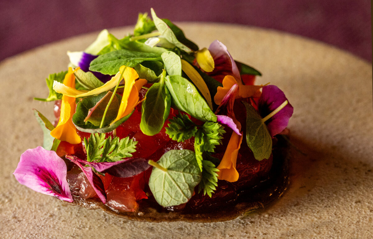 Tuna Tostada bite with garden herbs and tatemada from the new prix fixe tasting menu at The Lodge at Dawn Ranch Thursday, September 4, 2025 in Guerneville. (John Burgess / The Press Democrat)