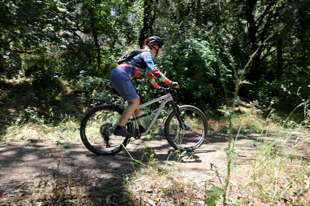 A cyclist pedals along the Lower Colgan Loop Trail at Taylor Mountain Regional Park & Open Space Preserve in Santa Rosa Tuesday, June 10, 2025. (Beth Schlanker / The Press Democrat)