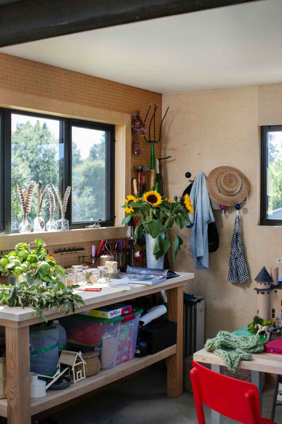 The two-story potting shed in the family's garden provides plenty of space for garden tools and a crafts room where Cristina Hobbs and her daughters spend many happy hours creating and sewing. In October, the girls turn the shed into a haunted house. (Eileen Roche / for Sonoma Magazine)