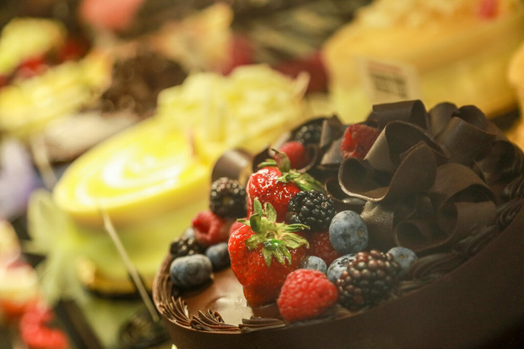 German chocolate mousse cake topped with fresh berries and chocolate ribbons from Oliver's Market in Windsor. (Sonoma County Tourism)