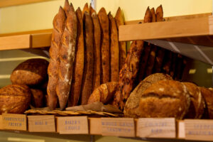 An assortment baguettes and other breads are displayed at Nightingale Breads, Sunday, October 9, 2022, in Forestville. (Darryl Bush / For The Press Democrat)