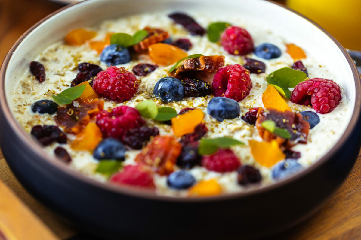 A bowl of overnight oatmeal topped with fresh berries. (Emma K Creative / Sonoma County Tourism)
