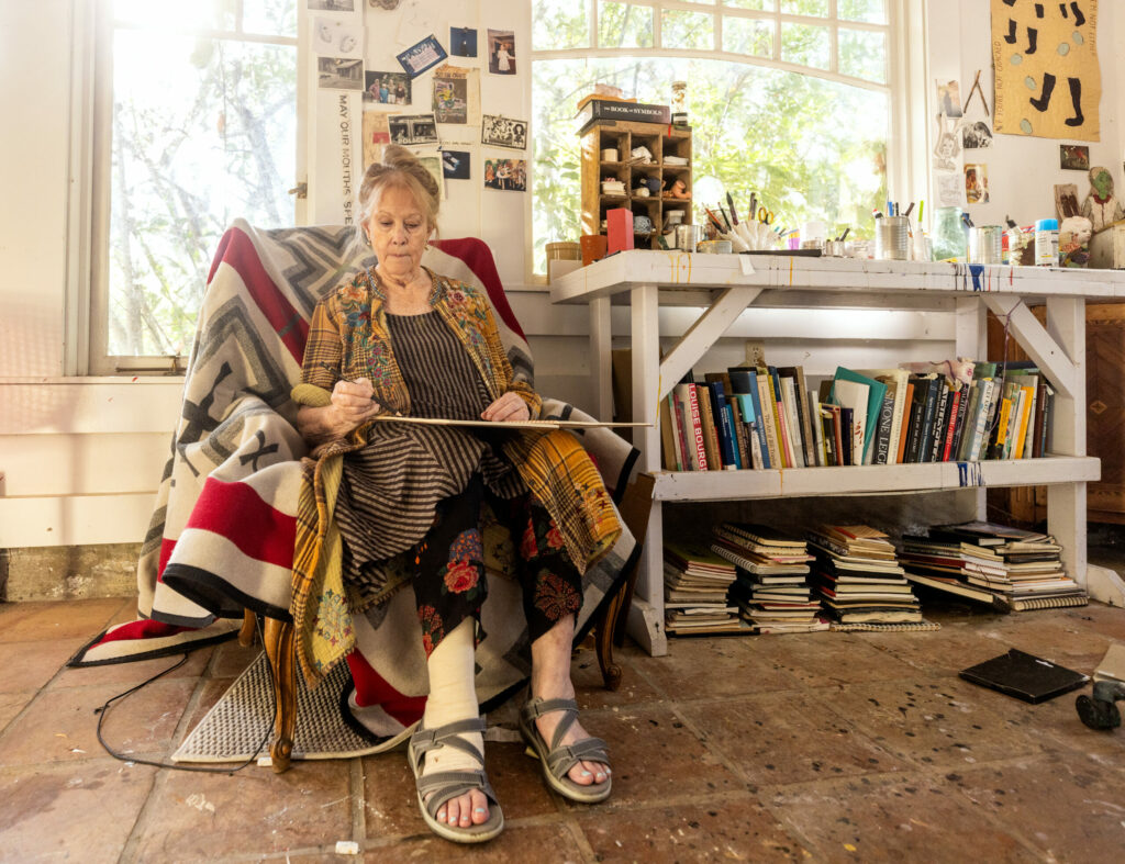 Artist Susan Preston draws birds for her latest piece while sitting in her studio sketching chair a quick walk from her home of 50 years in the Dry Creek Valley. (John Burgess / The Press Democrat)
