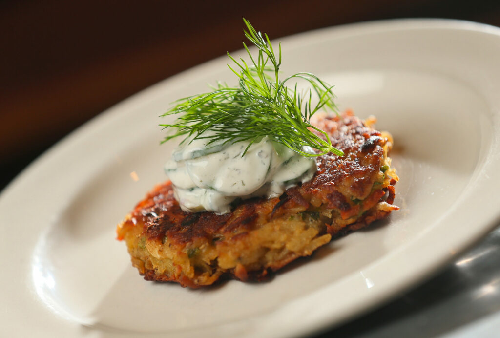 Potato Latke with sour cream and cucumber dill sauce by chef Shari Sarabi at Baci Cafe & Wine Bar in Healdsburg. (Christopher Chung / The Press Democrat, 2020)